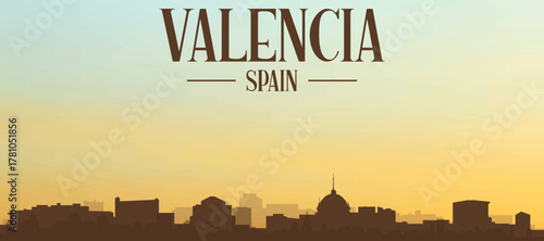 Panoramic poster of the city skyline with misty background buildings, hills sunrise, sunset and clouds of VALENCIA, SPAIN