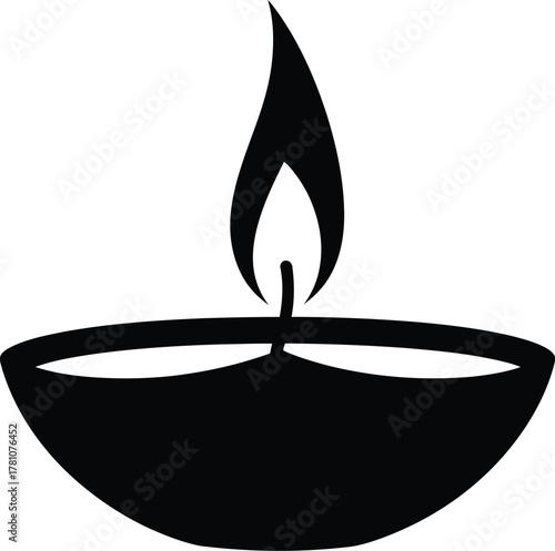 Simple black silhouette of a traditional indian clay oil lamp diya with a burning flame icon
