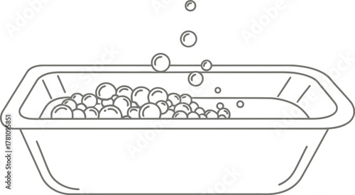 Line art icon of a bathtub filled with cleansing soap bubbles.
