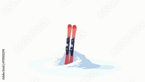 Red skis stuck in snow upright with bindings on snowy mound winter alpine concept