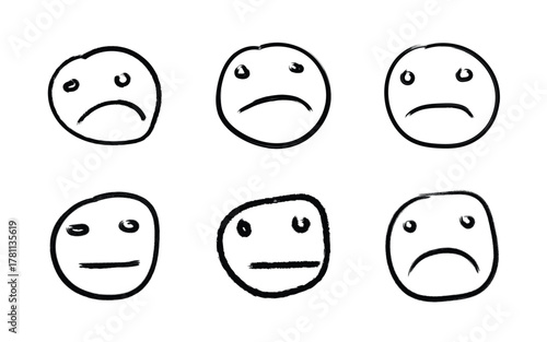 Six hand drawn sad faces expressing negative emotions and unhappiness
