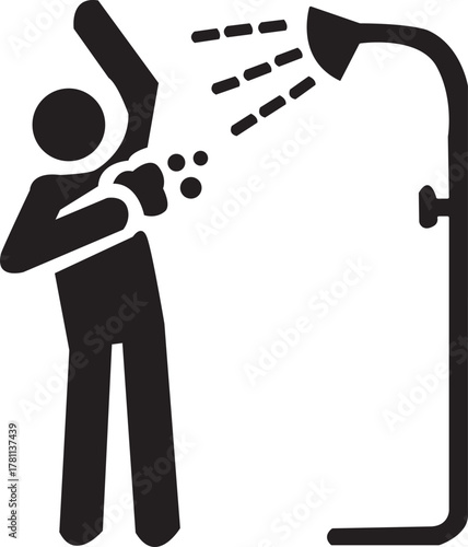 Person showering with a handheld shower head, spraying water