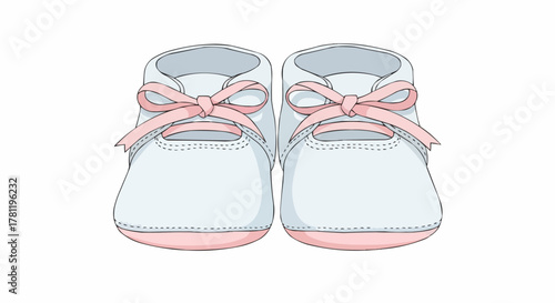 Baby shoes with cute pink ribbons, symbol of infancy