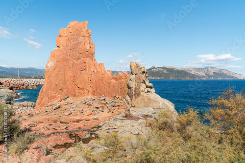Fototapet The famous red porphyry rocks, known as “Rocce Rosse,” located at the port of Arbatax, Sardinia, Italy
