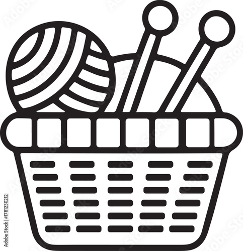 Woven craft basket with wool and knitting needles