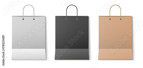 Realistic shopping paper bag set in white, black and brown color with rope handles for branding and retail. Paper package mockup. Vector illustration