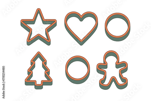 Collection of assorted cookie cutters in holiday shapes including star, tree, and gingerbread man