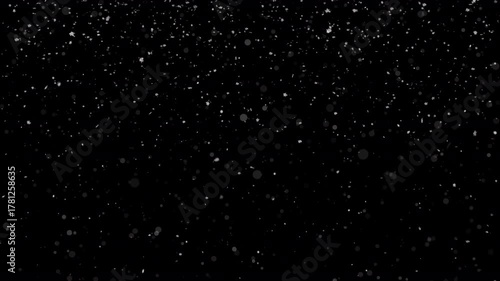 Animation with falling snowflakes and shimmering bokeh particles. Snowing loop, 50 FPS, ProRes with alpha channel (transparent background).