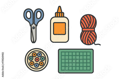 Essential crafting tools and materials set including scissors, glue, yarn, and buttons