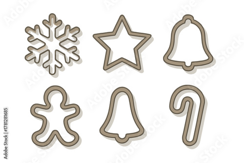 Collection of six Christmas cookie cutters shaped like a snowflake star bell gingerbread man and candy cane