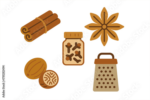 Aromatic baking spices set with cinnamon, nutmeg, star anise, cloves, and grater