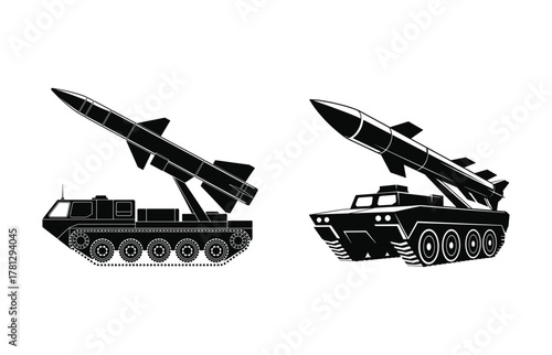 Two missile launchers with rockets aimed upwards military vehicle.