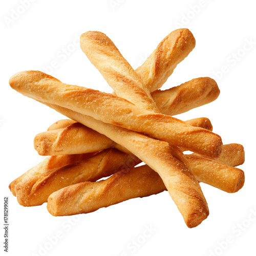 Freshly Baked Bread Sticks Served on a White Plate During a Cozy Kitchen Gath...