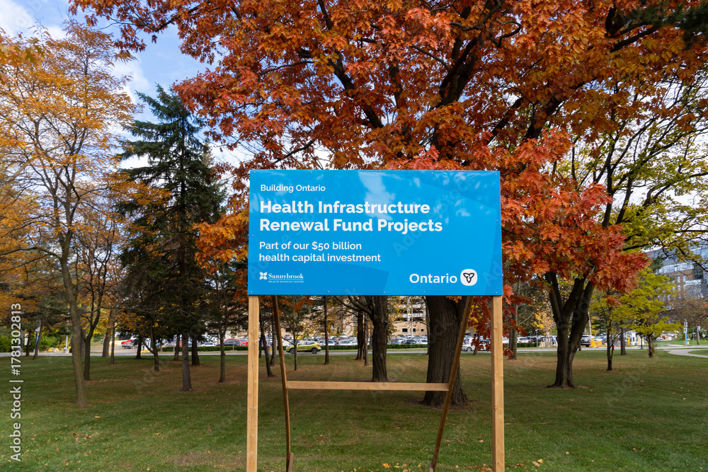 Fototapeta premium Toronto, ON, Canada - November 6, 2025: A signage for Health Infrastructure Renewal Fund Projects (HIRF) at Sunnybrook Hospital in Toronto. HIRF provides funding to hospitals for urgent projects. 