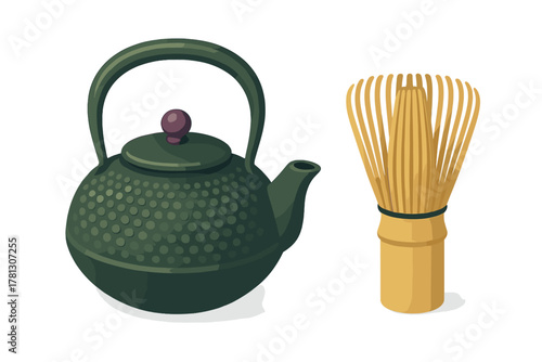 Traditional Japanese cast iron teapot and bamboo matcha tea whisk set for brewing green tea