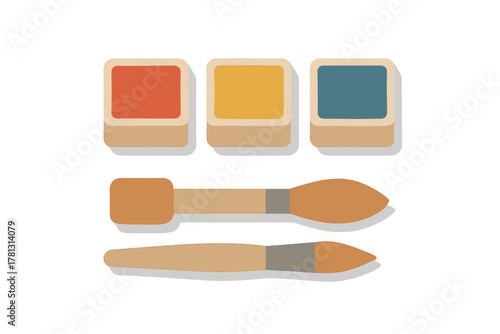 Watercolor paint pans and artistic brushes set for creative hobbies and art projects