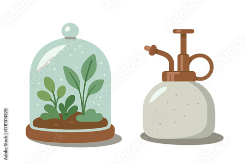 Small glass terrarium and vintage plant mister sprayer bottle for indoor gardening