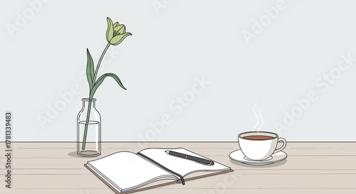 Open notebook with a pen lying on its pages next to a steaming cup of tea and a single-stemmed flower in a vase on a wooden table.