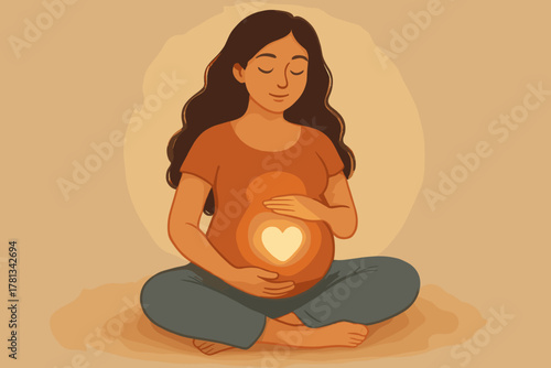 Young hispanic female sitting cross-legged with eyes closed, gently cradling her glowing pregnant belly with a heart symbol inside.