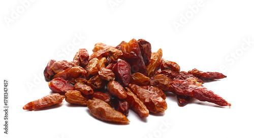 Fotografie Close up dried bird's eye chili peppers pile isolated on white background, side