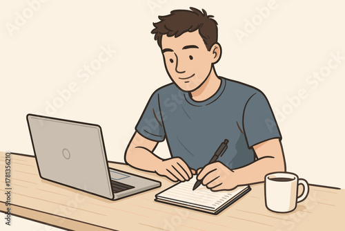 Young caucasian male adult writing in a notebook while using a laptop, with a coffee cup on the side, illustrating focus and productivity.