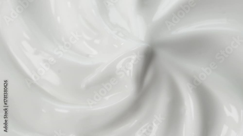 Creamy Swirl: A close-up view unveils a luxurious, creamy texture, its surface artfully sculpted into a mesmerizing swirl that exudes a sense of smooth elegance and sensory pleasure.