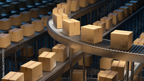 Cardboard boxes moving along factory conveyor