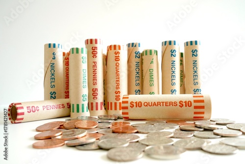 Rolled Coins and Loose Change on White Background – U.S. Currency, Savings and Banking