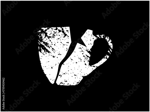 Broken mug illustrates fragility in domestic settings