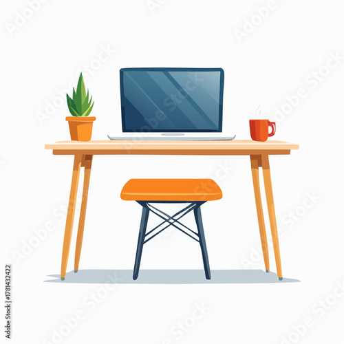 Desk with laptop and plant