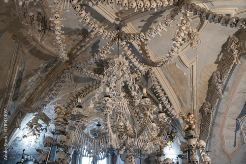 The famous bone chandelier, made entirely of human skulls and bones, at Sedlec Ossuary, a 14th-century Roman Catholic chapel, located beneath the Cemetery Church of All Saints.