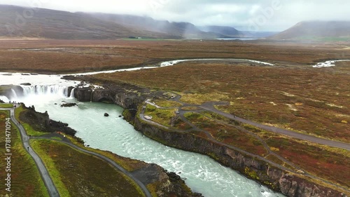 Aerial video of horse shoe shaped Godafoss waterfalls in Iceland