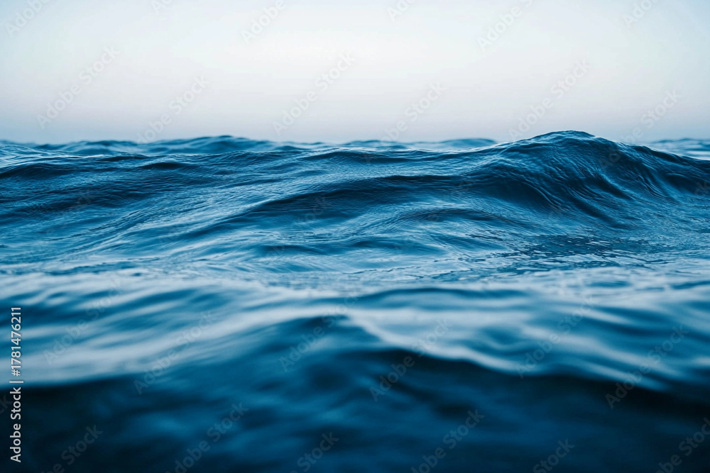 Fototapeta premium The contrast between deep ocean swells and tiny surface ripples