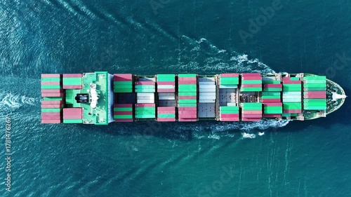 cargo ship carrying container and running for export goods from cargo yard port to custom ocean concept smart freight shipping by ship 