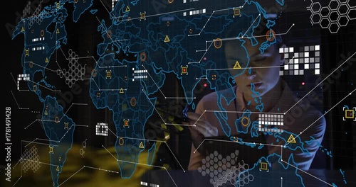 Female technician handling yellow cables in rack, tapping AR map, updating network alerts