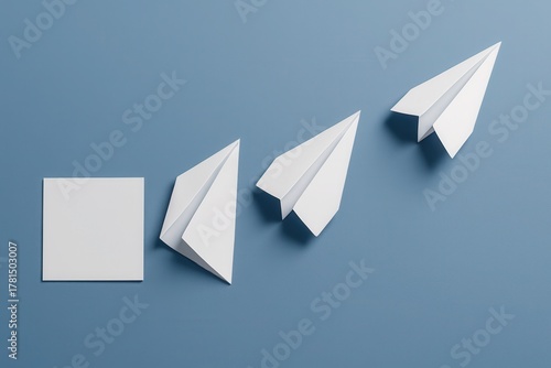 Paper airplanes in staged evolution ascending upward symbolizing growth progress and agility