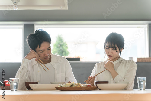 Married couples eating at home (cooking at home, dissatisfaction, bad taste, emotional abuse, marital quarrel, anger)
