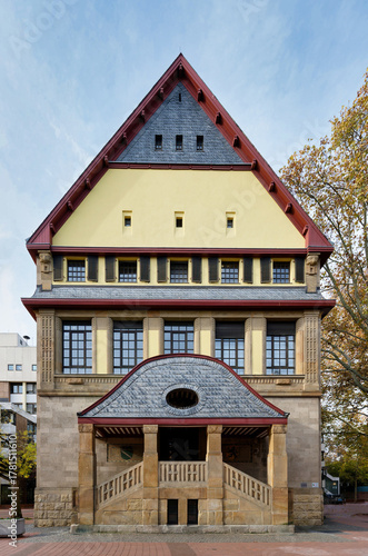 Close-up, frontal view of the historic Town Hall (Rathaus) in Frechen, Germany, emphasizing its stone double staircase and detailed architecture
