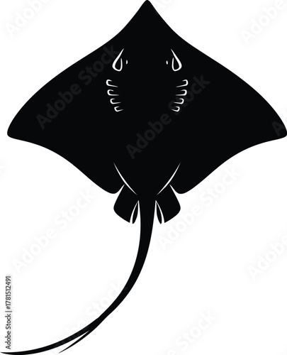 Silhouette of a stingray swimming gracefully in the ocean, , showcasing its unique shape and movement