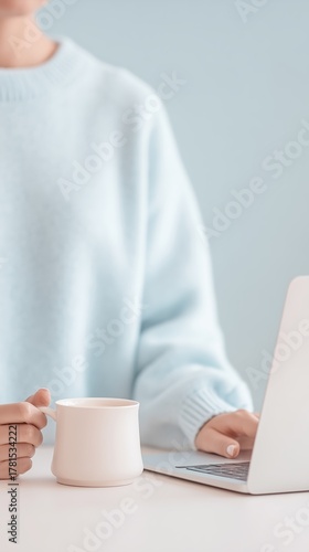 Coffee Laptop Connection person enjoys productive work session, combining beverage laptop use table, suggesting focused remote