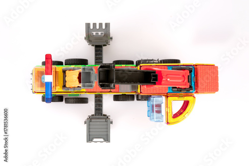 Overhead View of Vibrant Magnetic Toy Crane Truck Assembled with Colorful Blocks