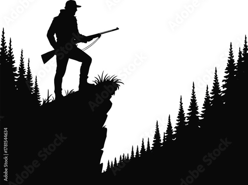 Silhouette of a hunter on a cliff overlooking a forest with a rifle