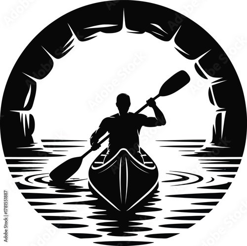 Kayaker entering a cave opening with a circular frame silhouette