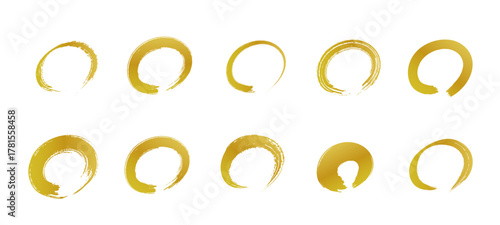 華やかな金色の筆で書いたような手描きの丸のセット