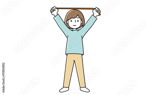 ゴムを使ってストレッチをする女性