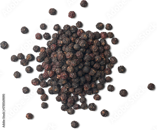 pile of black peppercorns, dark wrinkled spice isolated white background, concepts of culinary ingredients and seasoning, top view in close-up