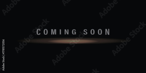 Coming Soon text banner with dramatic spotlight effect on a dark background for announcements