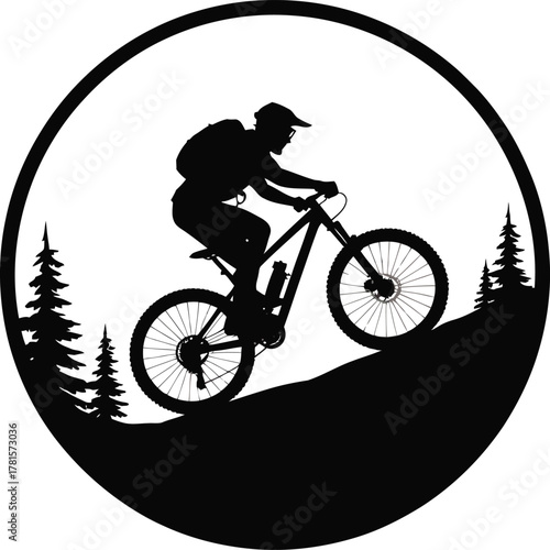 Mountain biker riding uphill through a forest in a circular silhouette