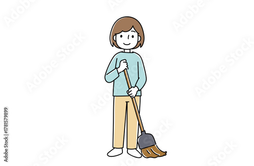 長いほうきで掃除する女性