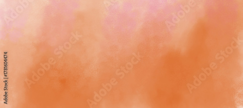 A soft, blended abstract background featuring shades of orange and pink. The colors transition smoothly,